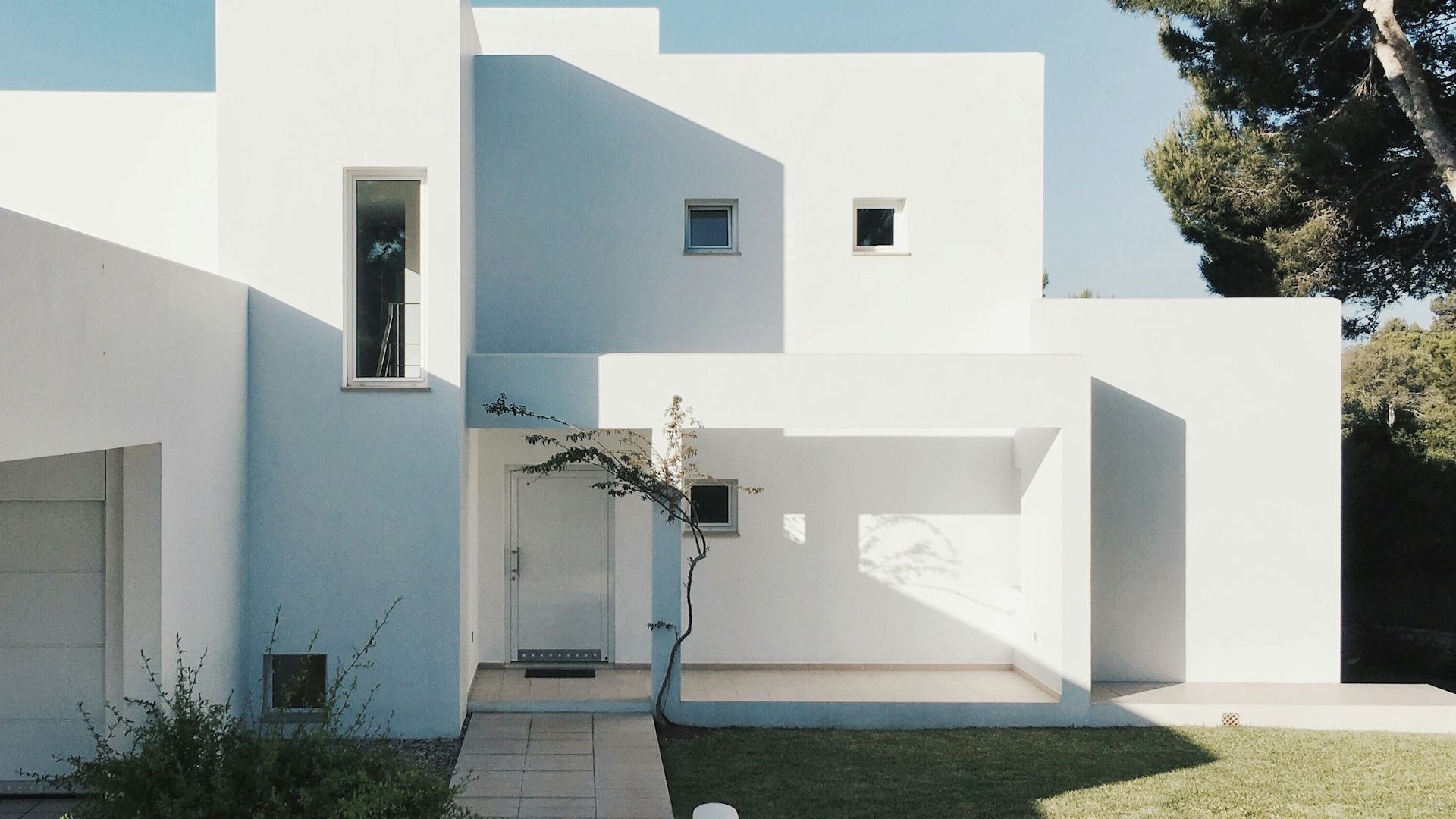Contemporary minimal residential villa exterior, representative of premium residential property